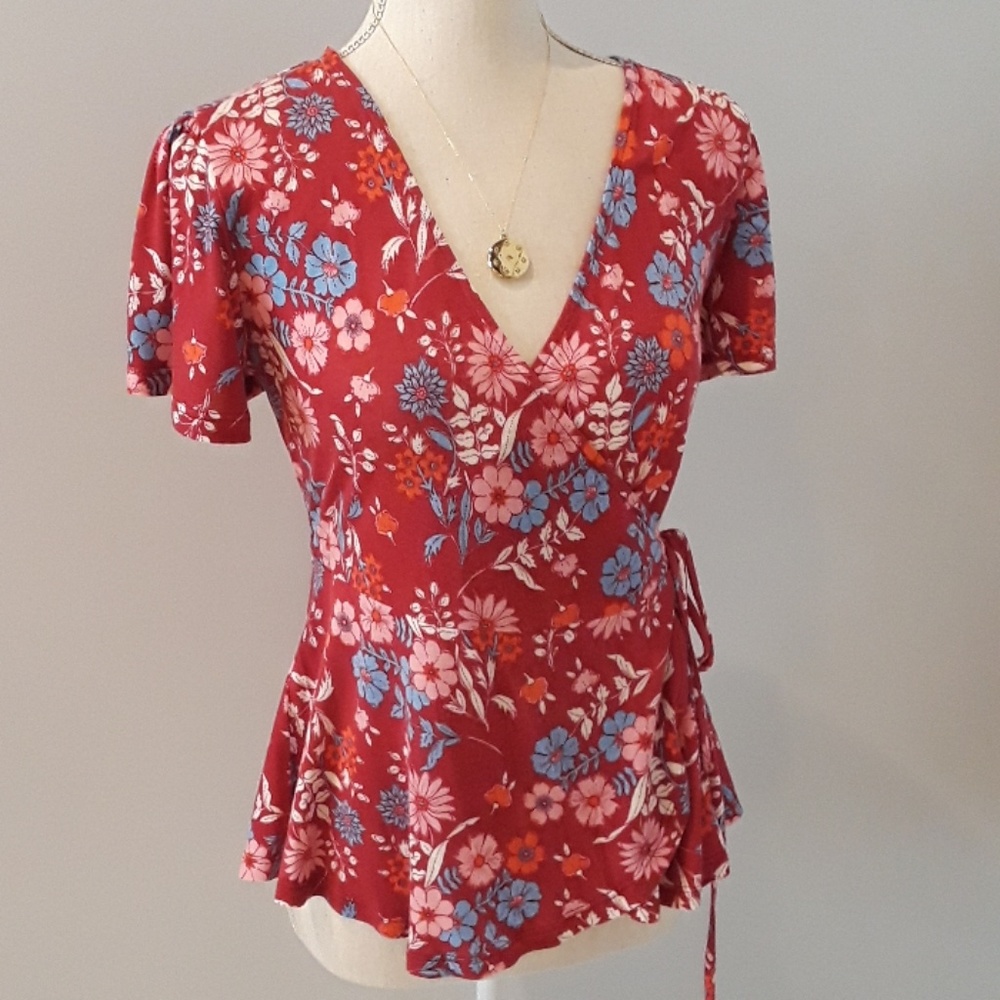 Cute wrap top. Worn once.